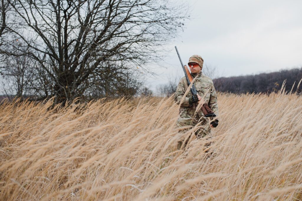 Hunting permit. Man brutal gamekeeper nature background. hunter spend leisure hunting.
